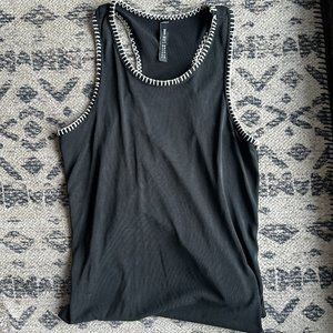 Black tank top with white stitching